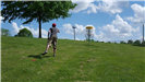 Man Throws Disc Toward Hole at Litz Park