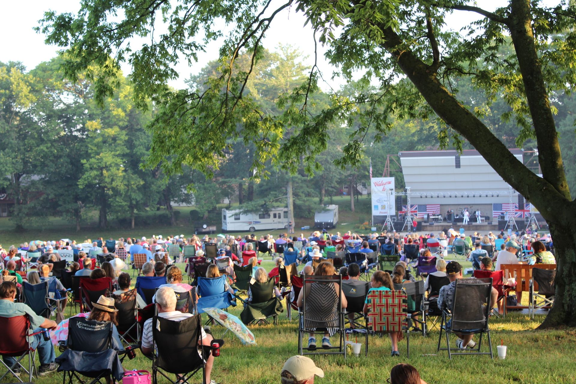 Large crowd watching concert at band shell